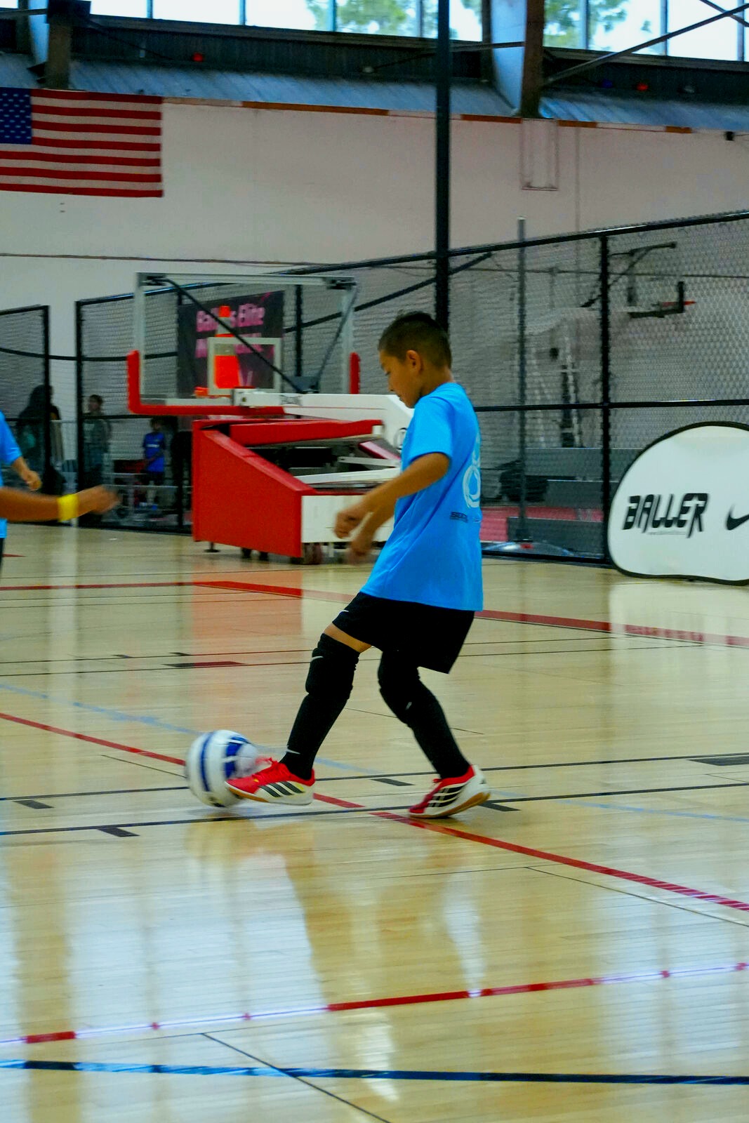 Futsalismo FC youth futsal players in action