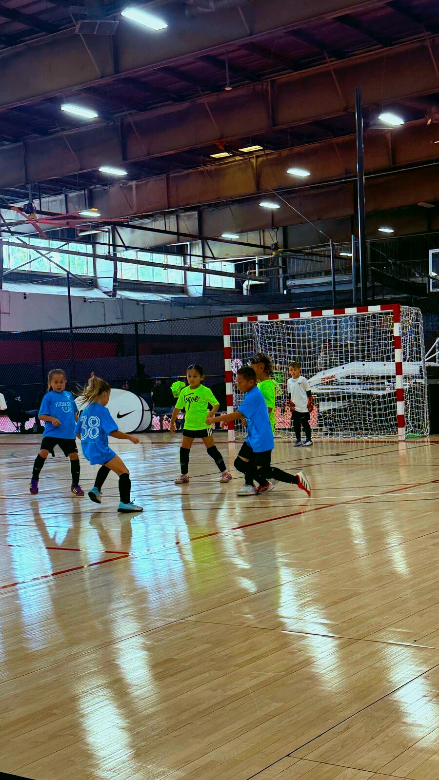 Futsalismo FC youth futsal players in action